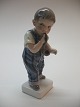 Dreng med pibe 
fremstillet af 
Dahl Jensen,nr 
1027, Højde ca. 
15,5 cm. 
1.sortering. 
Vare nr. 
168309.