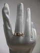 Ring i 8 karat 
guld med slebet 
hvid turmalin 
sten 
fremstillet ca. 
1920. Dansk 
Guldsmede ...