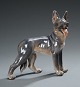 Dahl Jensen. 
Figur af 
porcelæn i form 
af schæferhund, 
nr. 1087. Højde 
21,5 cm.  I god 
stand. 2. ...