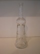 "Figurflaske" 
fra Fyns 
Glasværk. 
Fastblæst med 
rundt tværsnit, 
lodrette 
striber på 
skulder og ...