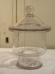1800-tals 
apotekerglas af 
klar glas
H.19cm. 
Ø.13,5cm.
