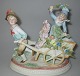 German biscuit 
figure of 
playful 
children, 19th 
century. 
Polychrome cold 
painted with 
gilding. ...
