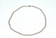 Perlekæde med 
hvid gulds lås 
14 Karat Guld
Stemplet: 14k 
G
Længde 35 cm. 
Perle 4 ...