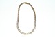 Guld halskæde 
med forløb, 14 
Karat Guld
Stemplet: 585, 
Gifa
Længde 41,5 
cm. Bredde 7,4- 
...