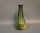 Keramik vase i 
gul og grøn fra 
1960erne, 
Signeret Ernst. 

H: 21,5 cm og 
D: 10 cm.