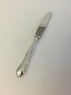 Cohr Ambrosius 
Spisekniv i 
sølv.
Måler 22.5 cm 
L 
Vejer 76 g

