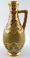 Fransk, 
Sarreguemines 
Art Nouveau 
kande i 
keramik, ca. 
1910. 
Flot glasur 
med guld 
intarsia. ...