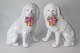Par puddel 
porcel&aelig;ns 
hunde med 
blomster kurve 
i munden, 
Tyskland, 19. 
&aring;rh. 
Hvidt ...