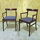 To armstole i 
mahogni med 
stofbetrukket 
sæder designet 
af Ole Wanscher 
produceret hos 
P. ...
