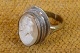 Camé ring af 
sølv med 
damehoved 
skåret af 
konkylie. 
Stemplet 800 
"B.S." -  B. 
Sanderstrøm - 
...