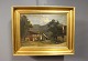Oliemaleri af 
hus i bjergene 
signeret A. 
Paul med 
træramme 
dekoreret med 
guldblad.
H - 35 cm, B 
...