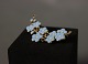 Fin 
blomsterbroche 
med blå emalje 
og i forgyldt 
925 sterling 
sølv.
B - 4 cm og L 
- 1,5 cm.