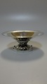Georg Jensen 
lille oval skål 
af sterling 
sølv 925s
Hammerslået, 
fod med 
stiliseret 
badværk. ...