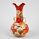 Satsuma vase. 
Fajance. Japan 
19. årh. 
Polykrom 
dekoration med 
figurer. H: 20 
cm.