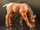Figur i  
glaseret 
keramik med 
motiv af  hest 
på græs nr. 
5987
Design af 
Michael 
Andersen, ...
