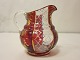 Glaskande / 
Flødekande
Rød-og-hvid 
antik 
flødekande i 
glas med smuk 
emaljebemaling
H: 9cm
Fra ...