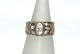 Gold ring with 
Zircons 8 karat 
gold
Stamp: 333, 
Jaa
Size 54, 17.19 
mm.
Width 9.5 ...