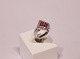 14 ct. White 
gold ring with 
0,30 ct. 
diamonds and 
pink saphire, 
stamped ERO.
Size 54.