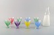 8 farverige 
cocktailglas 
med karaffel. 
"Party", Bengt 
Orup, 
Johansfors. 
Designet i 
1953. Svensk 
...