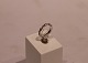 Snoet ring af 
925 sterling 
sølv med små 
zirkoner, 
stemplet CT.
Str.: 51.