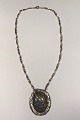 Unika Sterling 
Sølv Halskæde 
Delvist 
bestående af 
kæde No 283 og 
Magnolia blomst 
L 52 cm Vægt 
...