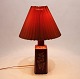 Rød bordlampe i 
keramik af 
Desiree 
Stentøjs fabrik 
fra 1970erne. 
Lampen er i 
flot brugt 
stand. ...