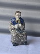 Figur af Fisker 
kone i glaseret 
keramik nr. 
4853
Design af 
Michael 
Andersen, 
Bornholmsk ...