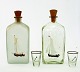 Holmegaard, 
kantineflasker 
med sejlskib i 
klar og 
matteret glas 
med original 
træprop. 
Designet ...