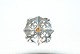 Elegant Broche 
i sølv med 
orange sten
Stemplet AM 
-1903 925 S
Højde 41,54
pæn og 
velholdt