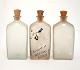 Holmegaard, 
kantineflasker 
i mat glas med 
original 
træprop. 
Designet af 
Jacob E Bang, 
produceret ...