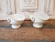 Cremefarvede 
keramikskål på 
fod med hanke.
Stemplet: 
Seidelin - 
Faaborg
Mål 12 x 16 
cm. Højde ...