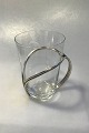 Georg Jensen 
Sterling Sølv 
Flaskeholder/Toddyglasholder 
No 790 Glasset 
Måler 8.5 cm x 
12.5 cm( ...