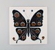 Bertil Lundgren 
for Rörstrand. 
"Galleri 2" 
vægplakette i 
glaseret 
porcelæn med 
sommerfugl. ...