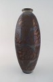 Stor Höganäs 
art nouveau 
vase i glaseret 
keramik. Smuk 
lustreglasur. 
1920/30'erne.
Måler: 36,5 
...