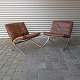 Et sæt 
loungestole med 
stel i stål og 
brune 
læderhynder
Design af 
Steen 
Østergaard
Flot ...