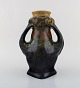 Rozenburg, Den 
Haag. Stor art 
nouveau vase 
med hanke i 
glaseret 
keramik med 
blomster. ...