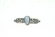 Elegant opal 
broche i 
sterling
Stemplet 925s
Længde 49,24 
mm
pæn og 
velholdt stand