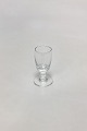Holmegaard 
Almue 
Snapseglas. 
Måler 7,6 cm. 
Designet af Per 
Lütken