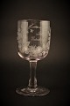 Gammelt 
erindrings glas 
fra Holmegaard 
glasværk med 
fine graveret 
blomster 
dekorationer og 
...