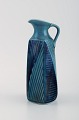 Vilhelm Bjerke 
Petersen 
(1909-1957) for 
Rörstrand. 
Fasett kande i 
glaseret 
keramik. Midt 
...