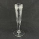 Højde 16 cm.
Flot mundblæst 
champagneglas 
fra midten af 
1800 tallet.
Glasset er med 
en flot ...
