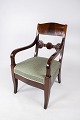 Armstol af 
mahogni og 
polstret med 
grønt stof fra 
1860erne. 
Stolen er i 
flot brugt 
stand.
H - ...