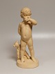 Ipsen keramik 
figur 
" I tanker" 
barn med bamse
kunstner Adda 
Bonflis
Højde 30cm.