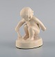 Adda Bonfils 
(1883-1943) for 
Ipsens Enke. 
Figur af pige 
med skovl i 
glaseret 
keramik. ...