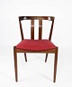 Spisestuestol i 
teak og 
polstret med 
rødt stof af 
dansk design 
fra 1960erne. 
Stolen er i 
flot ...