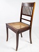 Skrivebordsstol 
af mahogni med 
intarsia og med 
fransk rørflet 
sæde, i flot 
antik stand.
H - 90 ...