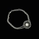 Georg Jensen. 
Sterling Silver 
Daisy Bracelet 
with black 
Enamel. Size 
XXS.
Crafted by 
Georg ...