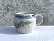 Bodil Westphal 
Enna keramik, 
Krus med hank, 
Med blomster og 
blå bånd *Pæn 
stand*
