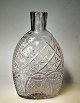 Lommelærke, 
klar glas, 
Conradsmide, 
pæreformet, 1/4 
pot, ca. 1850. 
Danmark. 
Skærsleben. 
Højde.: ...