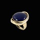Ring i 18k guld 
med Lapis 
Lazuli.
Stemplet BRK, 
18k.
Str. 57 mm.
2,9 x 2,1 cm. 
Vægt 17,6 ...